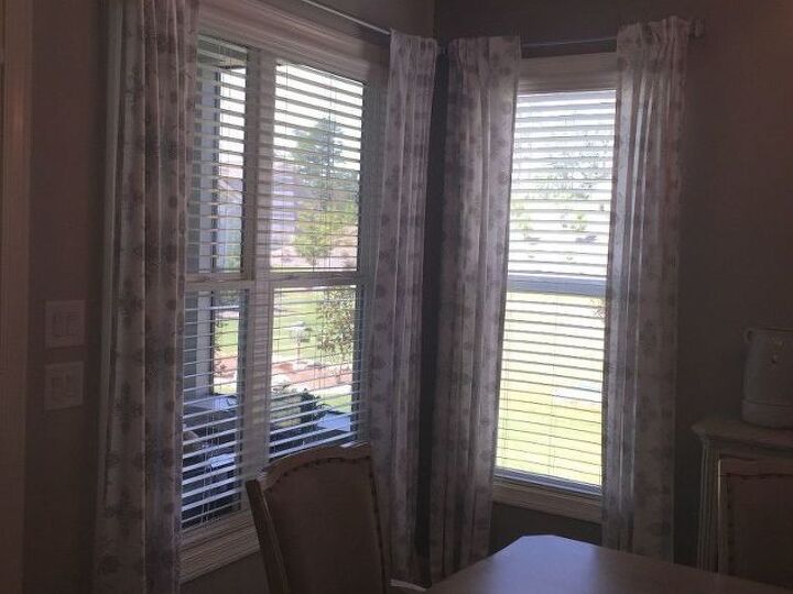 q i have curtains in dining room that i do not like the way they hang