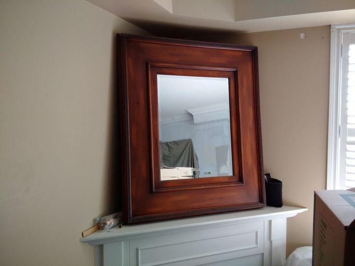 how can i hang this mirror over a corner fireplace