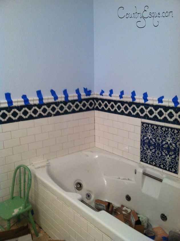 bathroom makeover with subway tile wainscoting before after