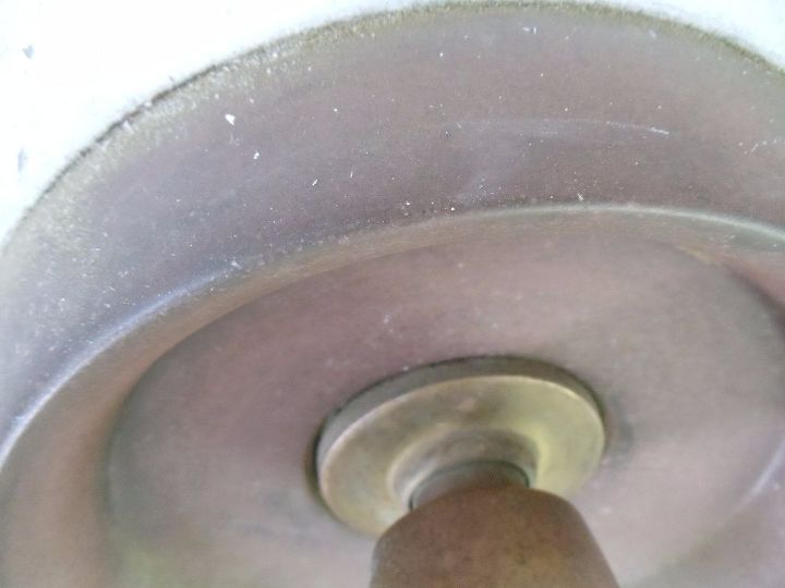 q how to clean old brass doorknobs