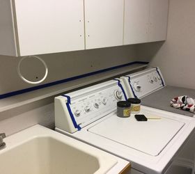 Tape off the sides of your washer & dryer for a 1-day laundry room update