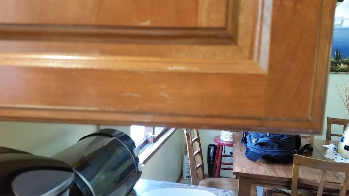 how can i fix the peeling lacquer clear coat on my kitchen cabinets
