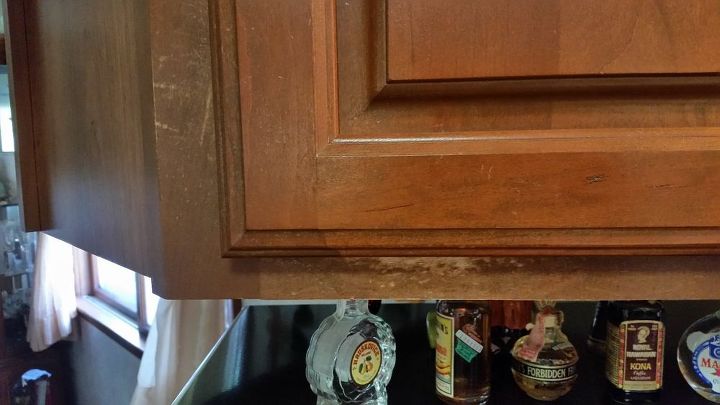 how can i fix the peeling lacquer clear coat on my kitchen cabinets