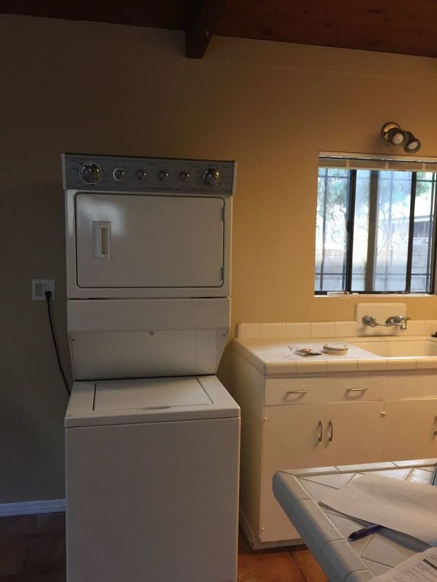 How to hide washer and dryer in kitchen