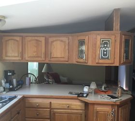 want to remove upper cabinets suspended over counter in mobile home