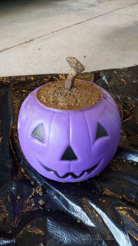 s bibbidi bobbidi boo 3 pumpkin ideas for a magical halloween, Step 4 Stick a rail road spike for stems