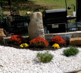 landscaping with rocks and mums
