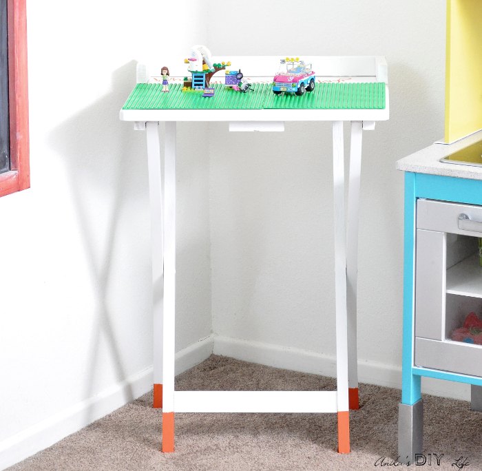 turn an old tv table into a fun place for legos