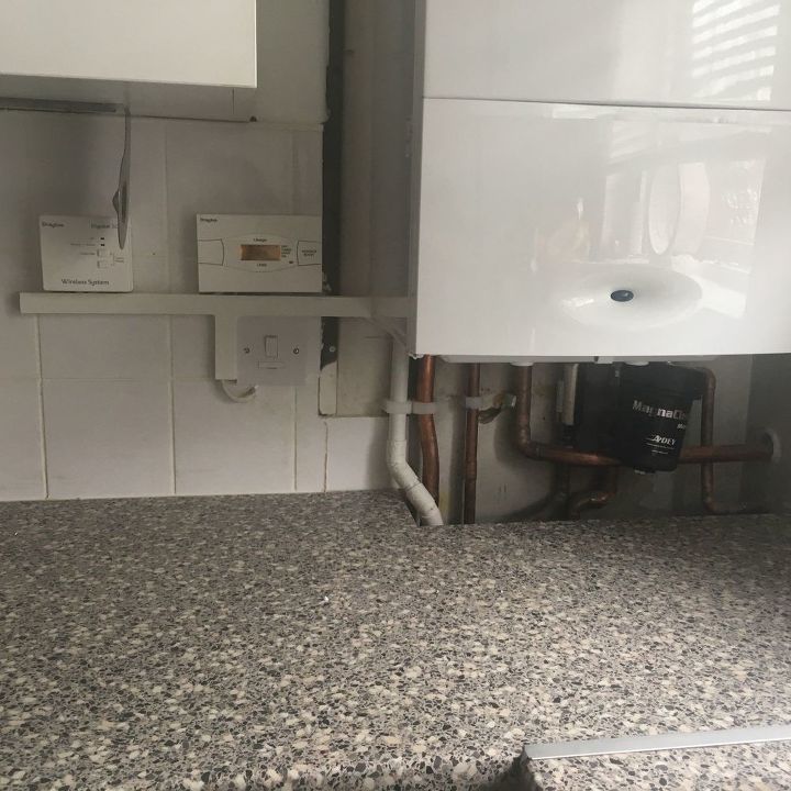 a new idea to hide boiler pipes in the kitchen