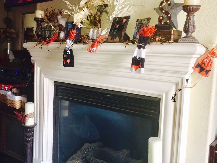 repurpose your old sweaters into fall harvest decorations, How festive does this make the mantle look