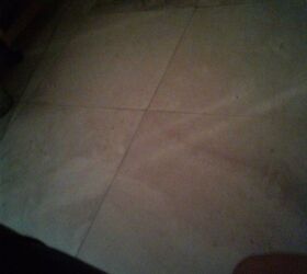 q how to get scratched up tile floor clean and polished