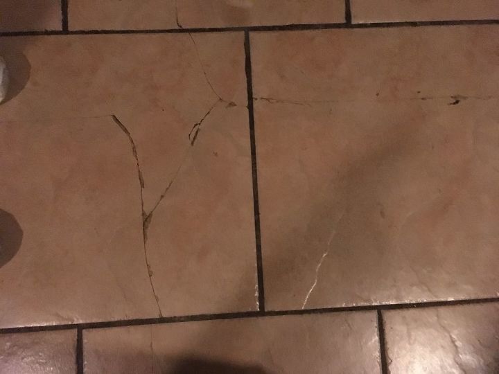q cracking kitchen floor tiles
