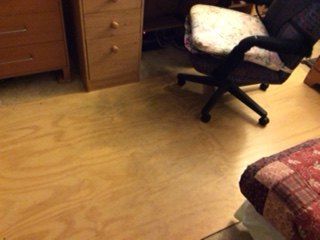how to put a tough surface on a plywood sheet under my computer chair