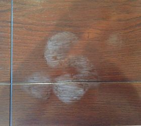 q how can i remove white heat water marks from my dining room table