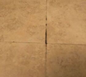 q my peel stick tiles has adhesive coming through between the tiles
