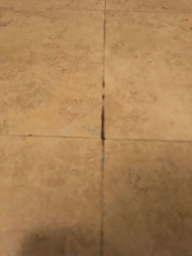 q my peel stick tiles has adhesive coming through between the tiles