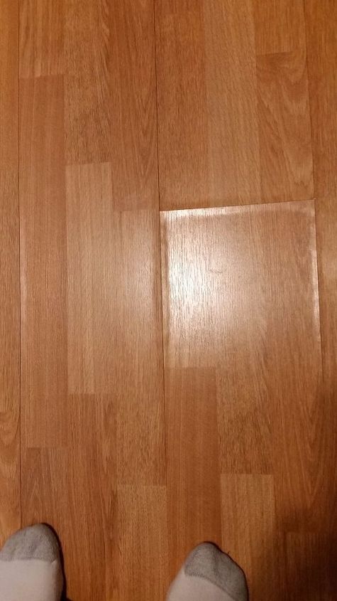 how do you fix a laminate floor that has swelled after a fridge leak