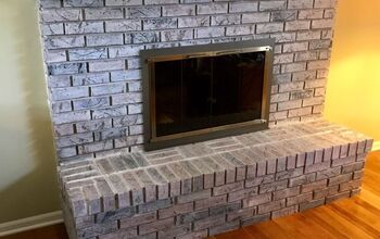 q how do i clean fireplace brick of suet to ready it for painting
