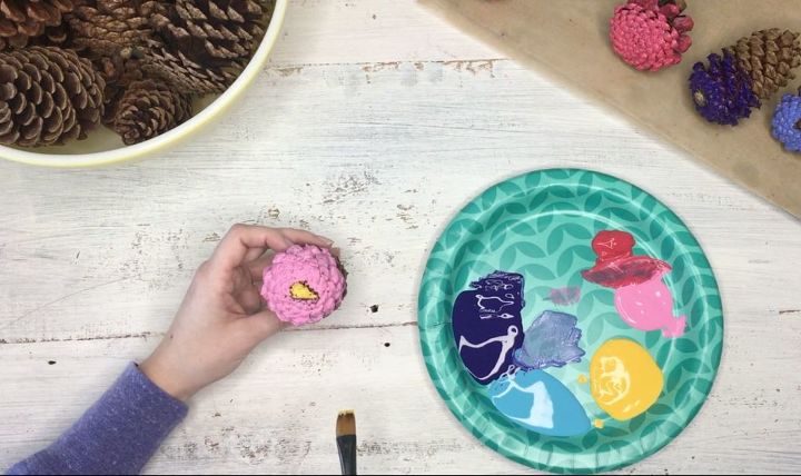 s 3 wreath ideas to brighten up your front door, Step 3 Paint pinecone s center in yellow