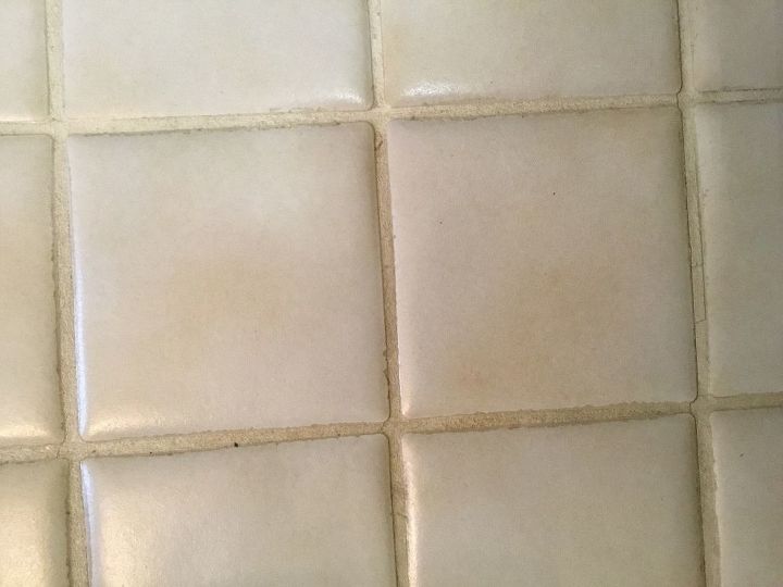 q how to fix grout that was sealed when dirty looks awful