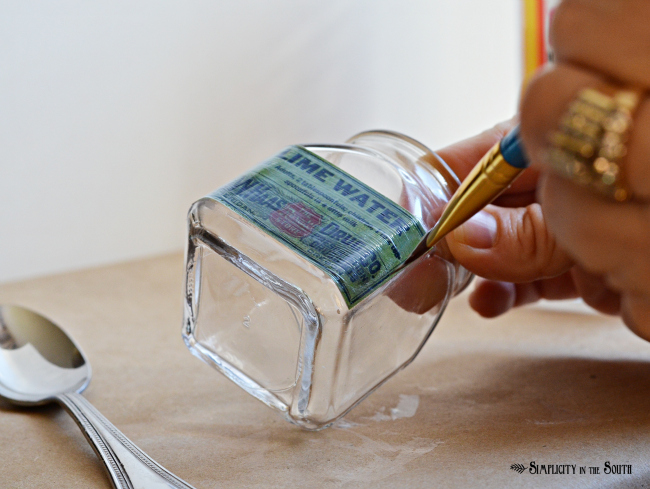 26 stunning ways to use mod podge in your home, Or add vintage labels to glass jars