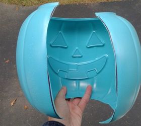 Cut up a plastic pumpkin bucket for this insanely simple outdoor idea