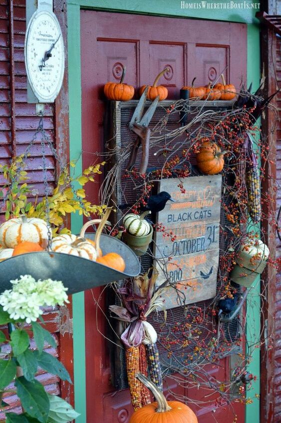 adding a spooky sign to the potting shed for halloween