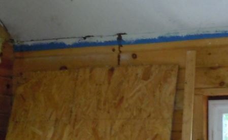 q something has left dark spots running down the walls in cabin