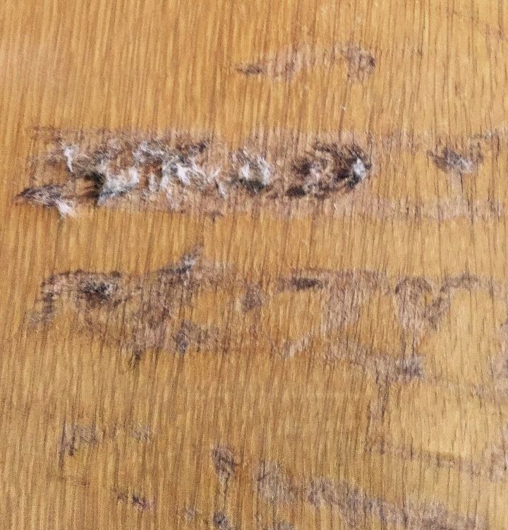 residue on the lid of a vintage lane cedar chest