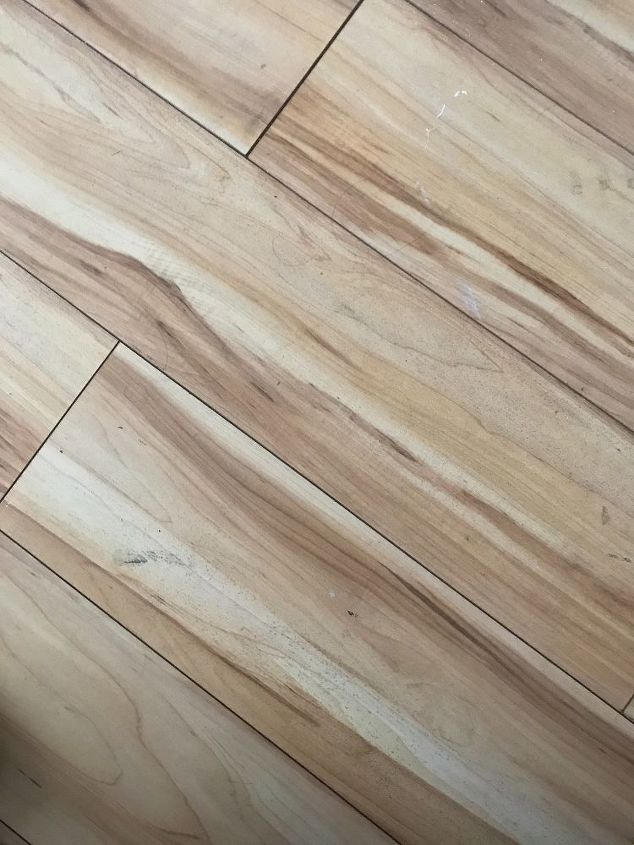q can laminate floors be varnished a different colour