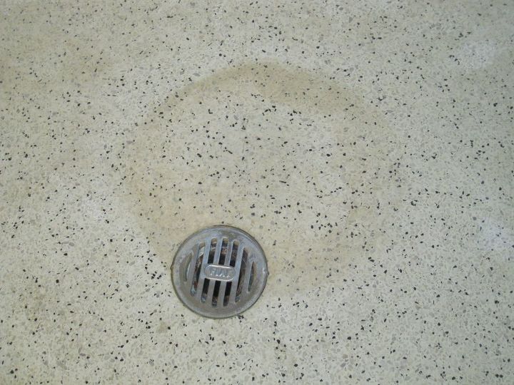 how do i clean stains from a glazed concrete shower floor