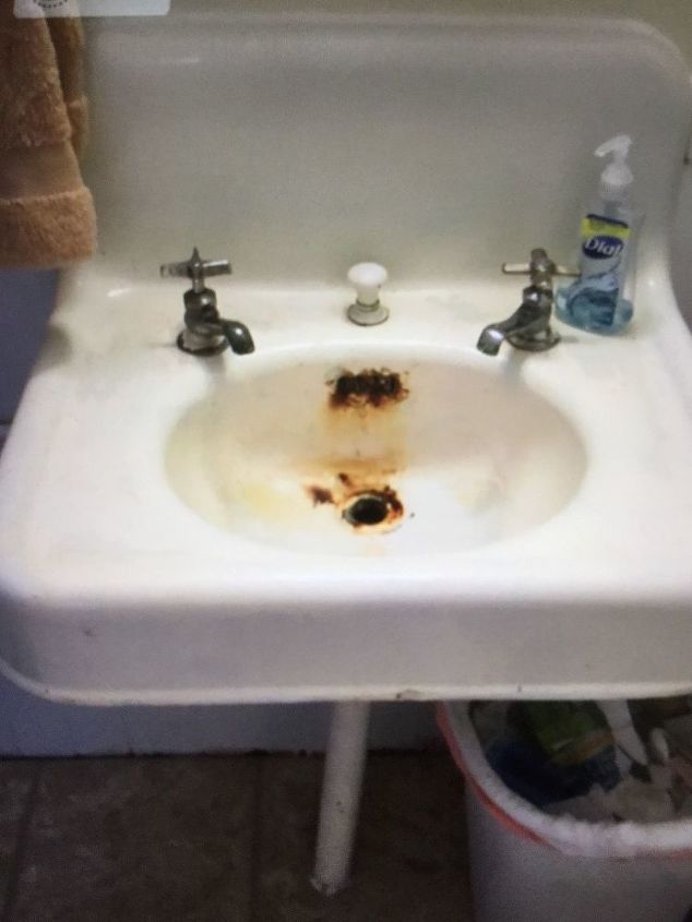 remove rust from an antique sink