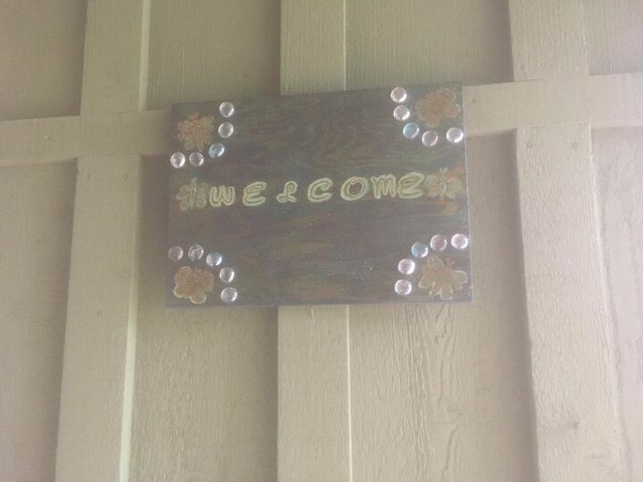welcome sign with scrap wood and unicorn spit