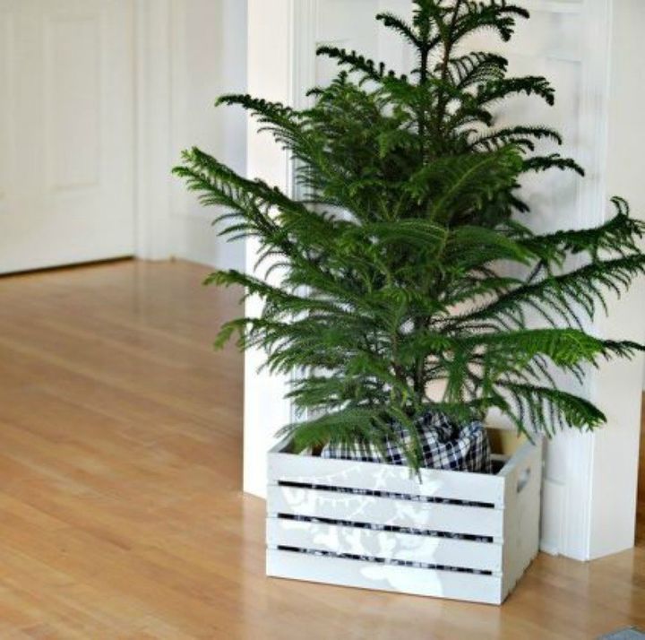 s 30 reasons we can t stop buying michaels storage crates, They make the perfect Christmas tree base