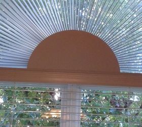 q how to wash a inside 72 inch arched window without removing the blinds
