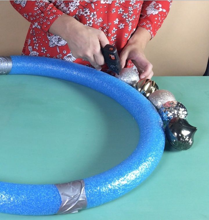 grab some pool noodles and copy these 3 ideas, Step 3 Hot glue large ornaments
