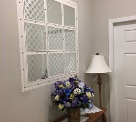 faux window deceptively makes the foyer bigger