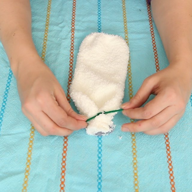 s upcycle your old clothing items for these great ideas, Step 2 Tie off the cut end of sock