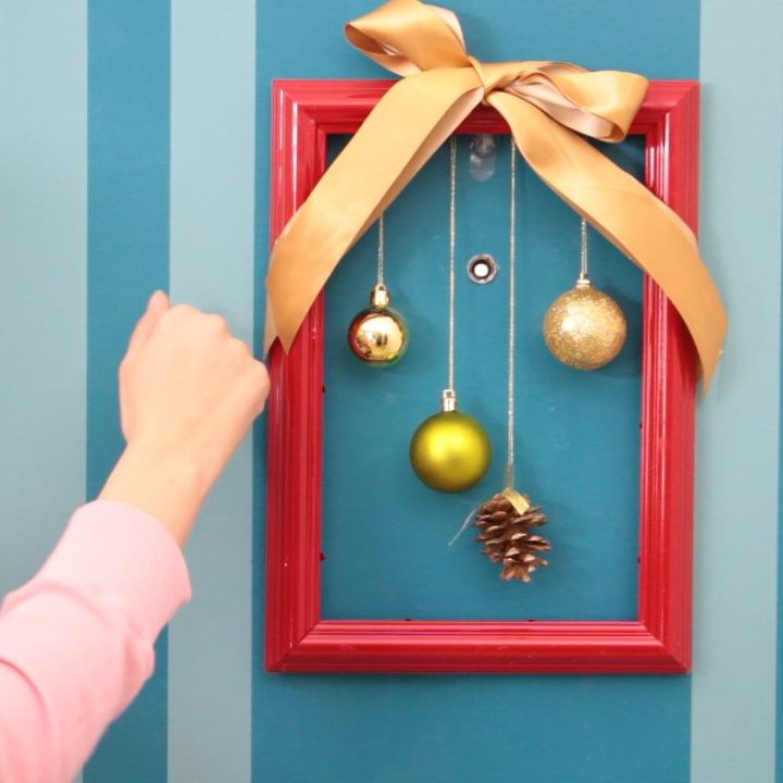 s 3 gorgeous ideas to use photo frames and not for pictures, Step 5 Hang and admire this cute wreath