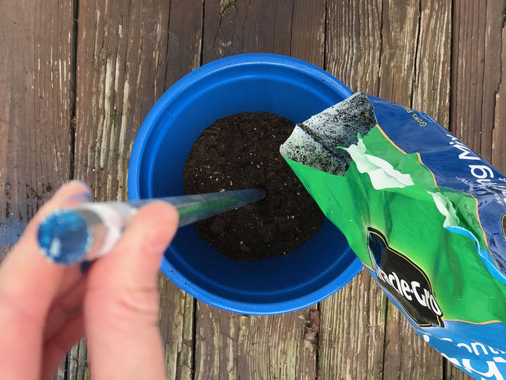 s 3 gorgeous and unique ideas to display your plants, Step 2 Pack a pot with soil around a rod