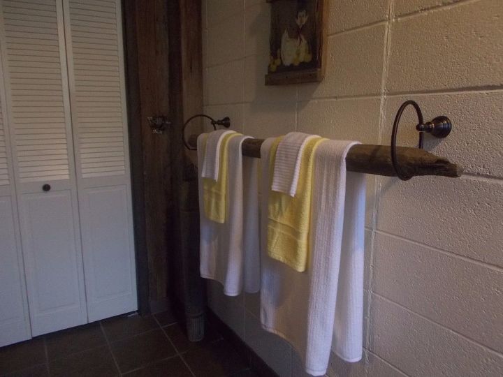 barnwood tin bathroom renovation, Fence Post Towel Rod