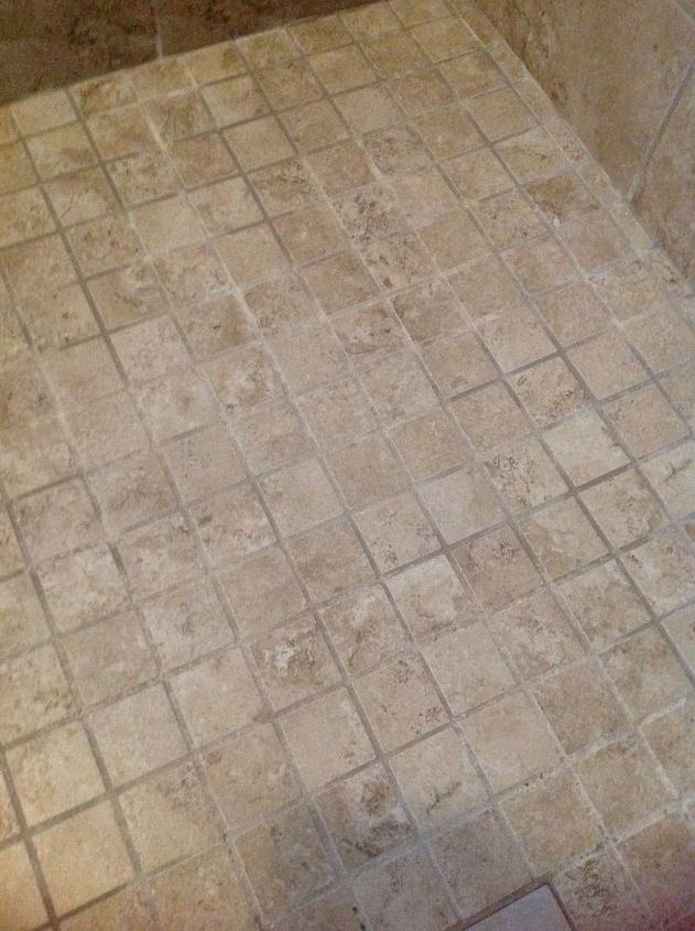 porcelain tile walk in shower how to clean a white film on it