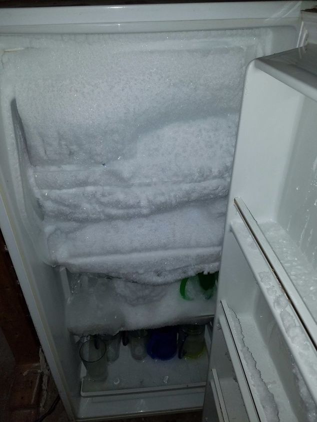 defrost old freezer without flooding basememt