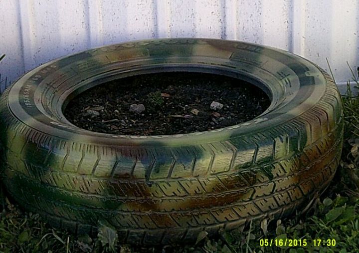 camoflauged but not hidden tire planters