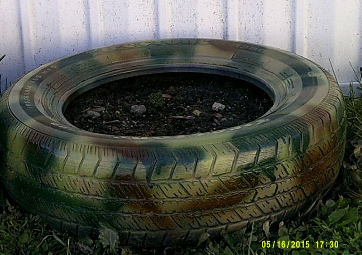 Camoflauged But Not Hidden Tire Planters Hometalk Hidden Tire Planters