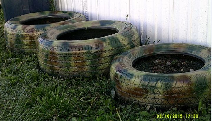 camoflauged but not hidden tire planters