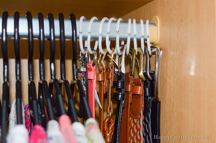 s 30 genius ways to make the most of your closet space, Hang belts using shower curtain rings