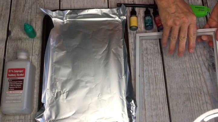 s super cool painting techniques you ve probably never seen, Step 2 Place glass onto aluminum foil tray