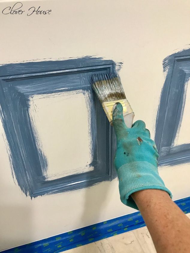 painting a paneled door with a window