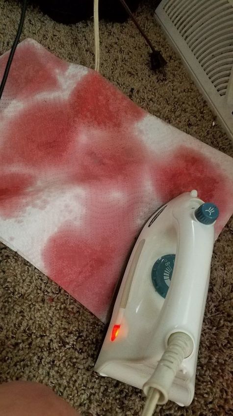 how to fix candle wax that is on carpet